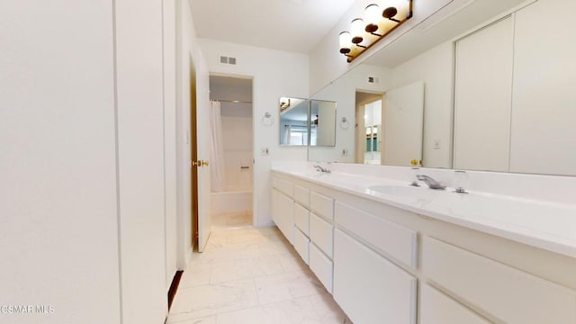 bathroom with vanity and shower / bath combo with shower curtain