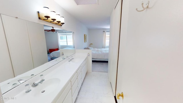 bathroom featuring vanity and ceiling fan