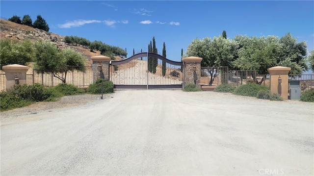 34135 Cameron Dr, Sage, CA 92544 - view of gate featuring fence