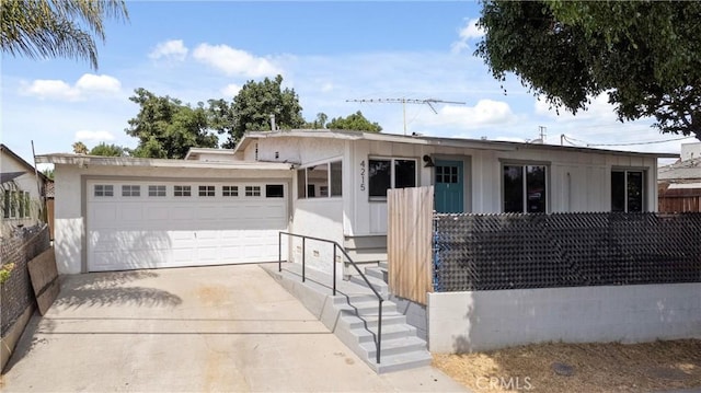 view of front of home featuring a garage