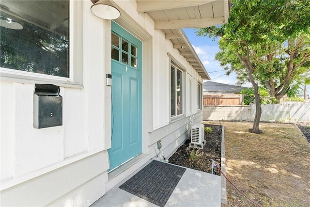 property entrance featuring ac unit