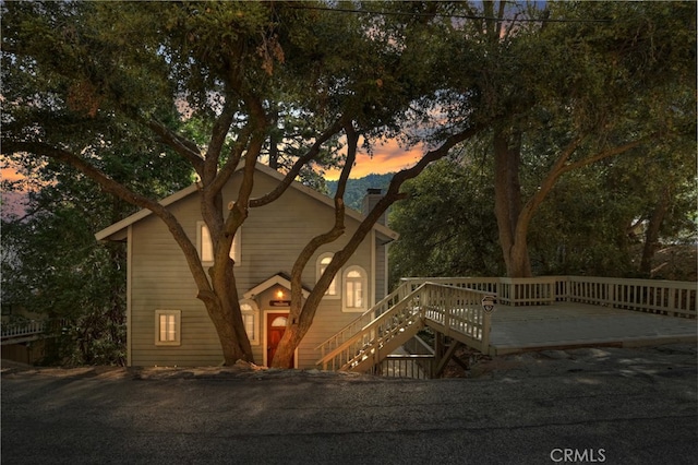 view of front of house with a wooden deck