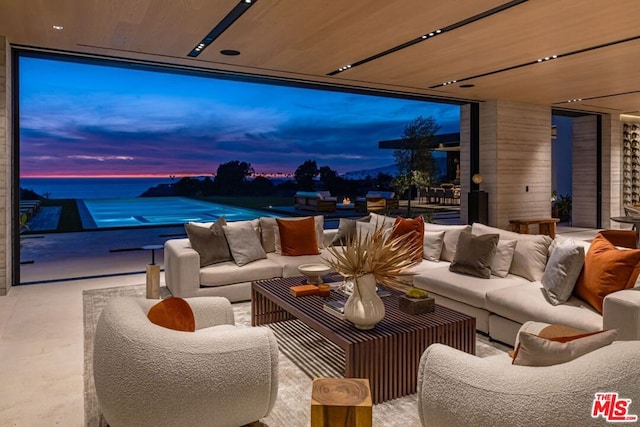 home theater featuring wood ceiling