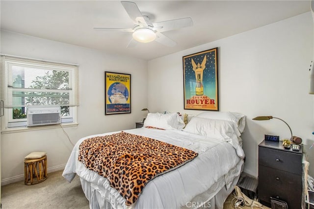 carpeted bedroom with ceiling fan and cooling unit