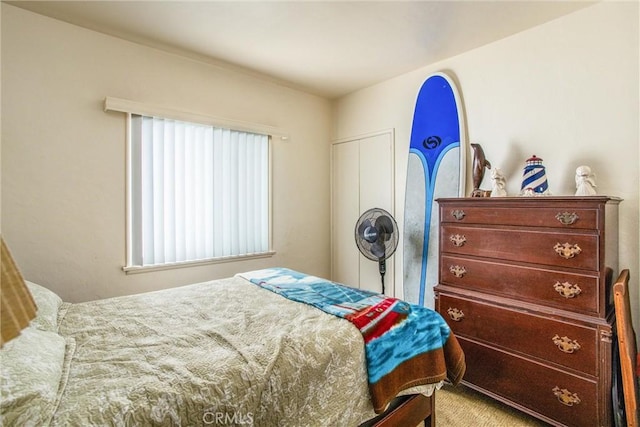 bedroom with light colored carpet