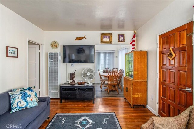 living room featuring dark hardwood / wood-style floors