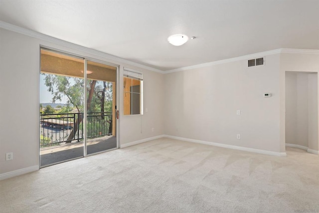 unfurnished room with light carpet and ornamental molding