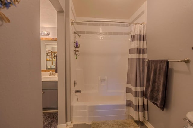 full bathroom with tile patterned flooring, sink, shower / bath combo, and toilet