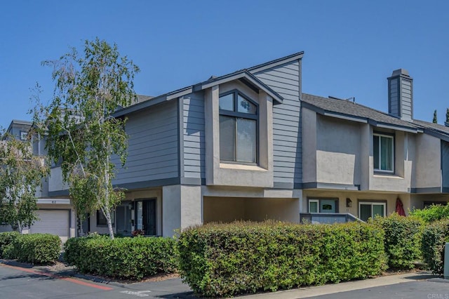 view of building exterior with a garage