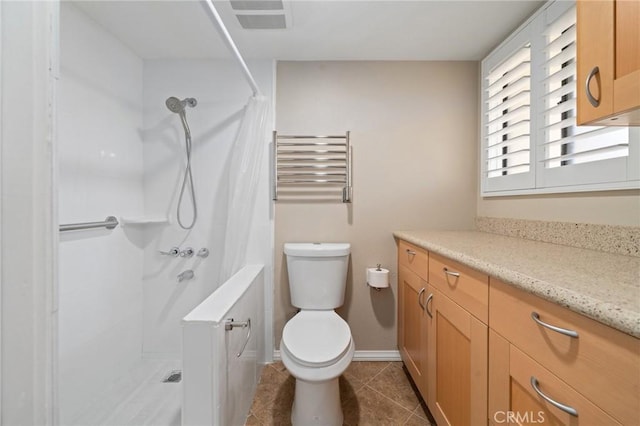 bathroom featuring vanity, radiator, tile patterned floors, toilet, and curtained shower