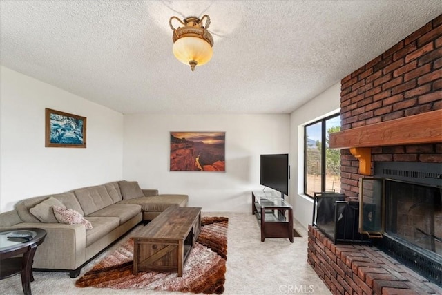 carpeted living room featuring a fireplace and a textured ceiling