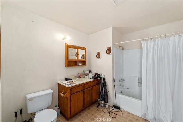 full bathroom featuring shower / bath combo, toilet, and vanity