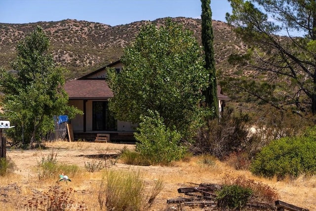 view of front of home with a mountain view