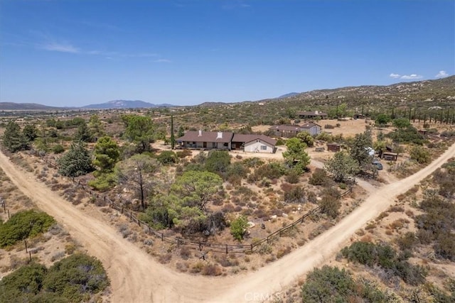 drone / aerial view featuring a mountain view