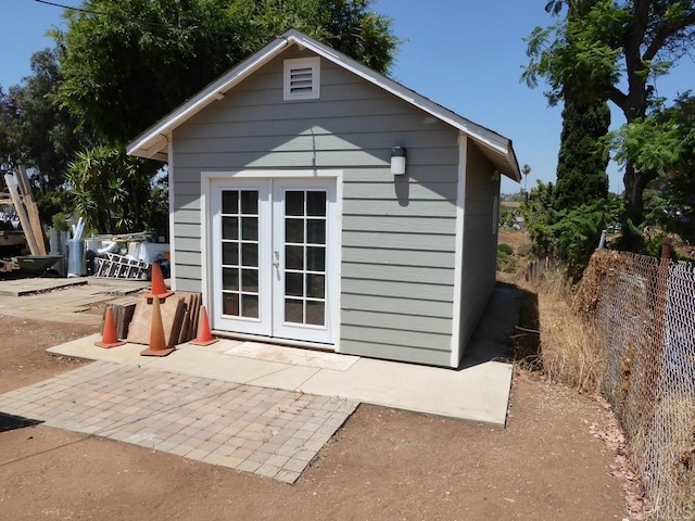 view of outbuilding with french doors