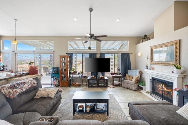 living room featuring light tile patterned flooring and ceiling fan