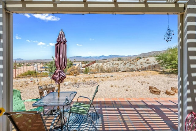 view of patio with a mountain view