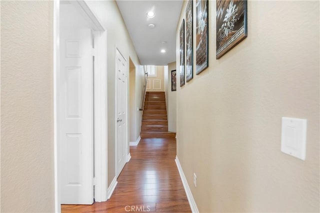 hallway featuring hardwood / wood-style flooring