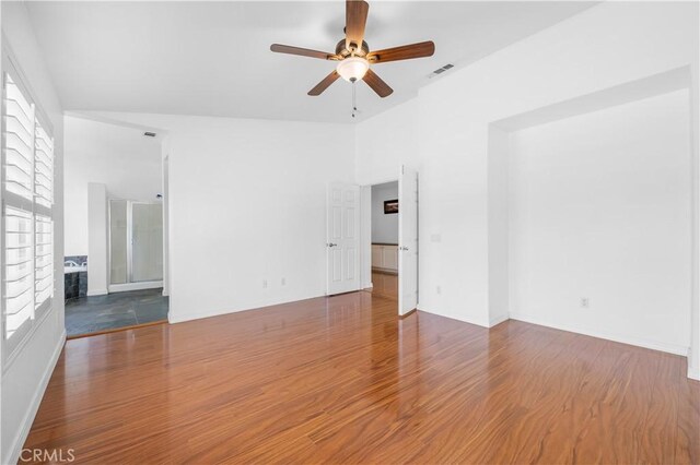 empty room featuring wood-type flooring and ceiling fan