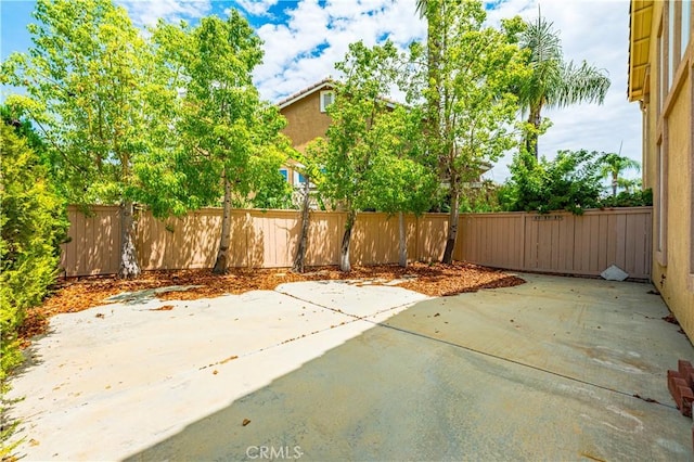 view of patio / terrace featuring fence