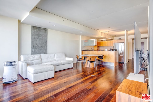 living room featuring dark hardwood / wood-style floors