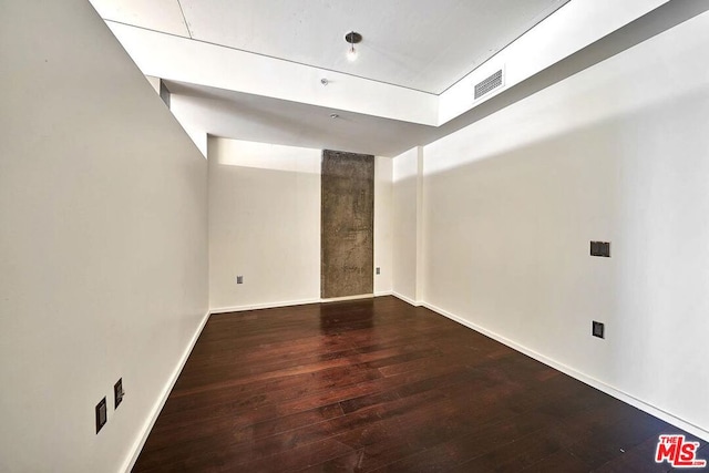 empty room featuring hardwood / wood-style flooring