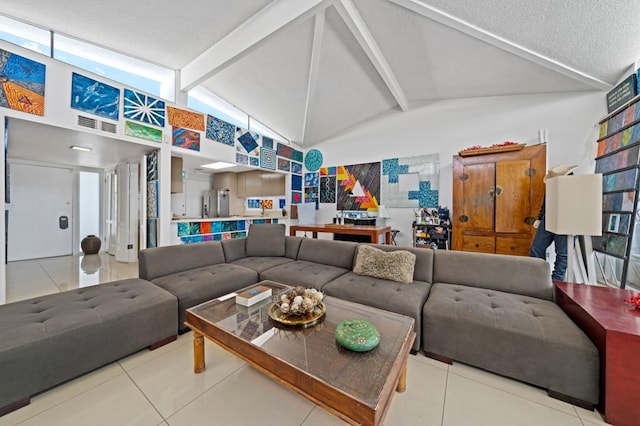 living room featuring tile patterned floors, lofted ceiling with beams, and a textured ceiling