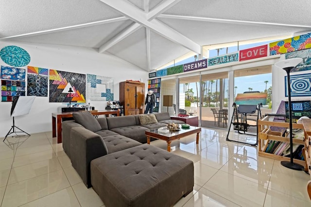 living room with a textured ceiling, lofted ceiling with beams, and light tile patterned floors