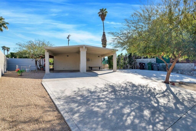 view of front facade with a carport