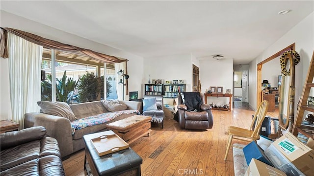 living room with light hardwood / wood-style flooring