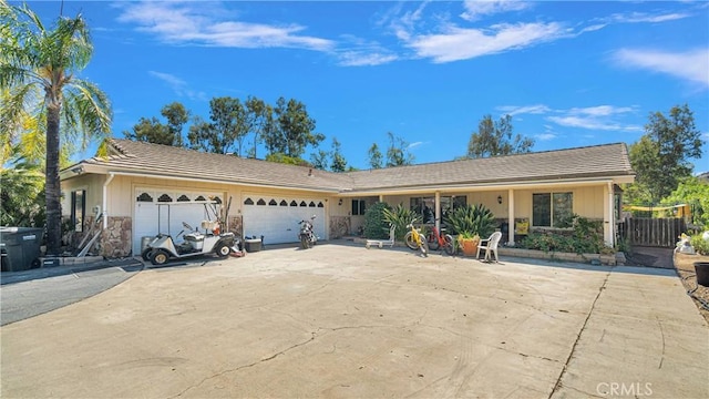 single story home featuring a garage