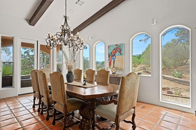 tiled dining room featuring beam ceiling and a healthy amount of sunlight