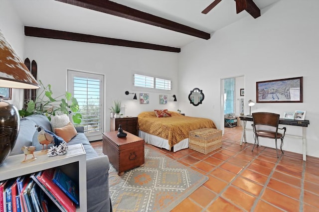 bedroom featuring beamed ceiling, tile patterned floors, and ceiling fan