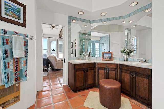 bathroom featuring vanity, tile patterned floors, and ceiling fan