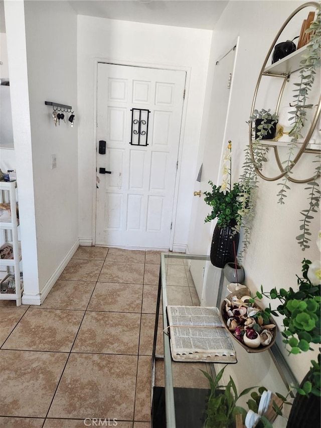 view of tiled entrance foyer