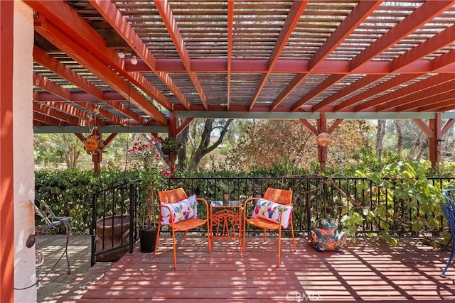 view of patio / terrace featuring a pergola and a wooden deck