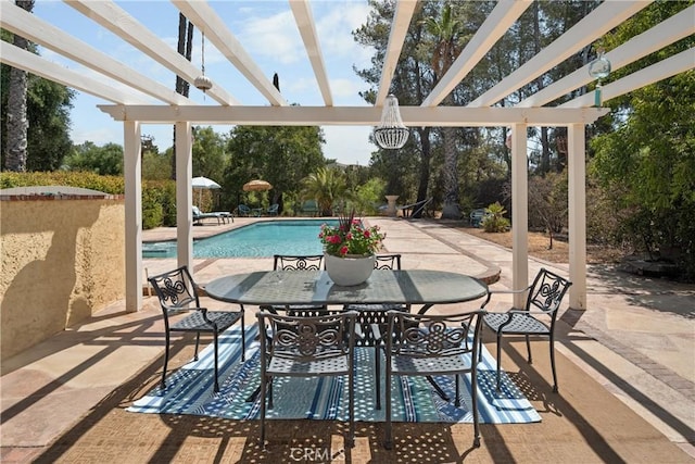 exterior space featuring a pergola and a community pool