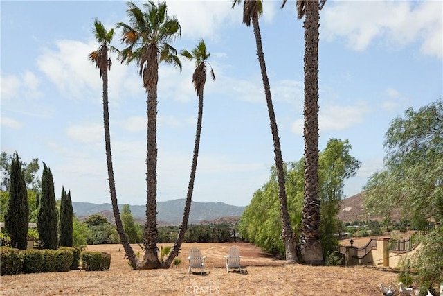 exterior space with a mountain view and a rural view