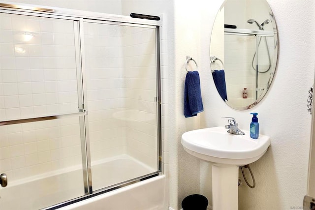 bathroom featuring enclosed tub / shower combo