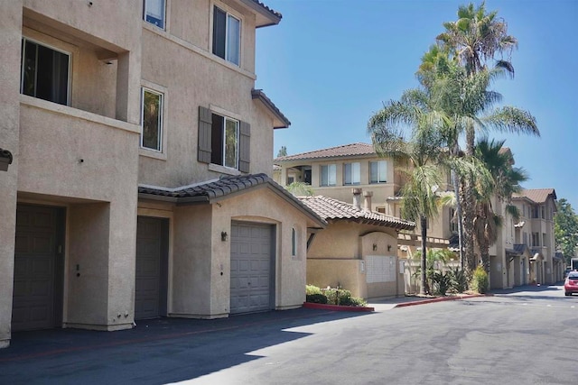 exterior space with a garage