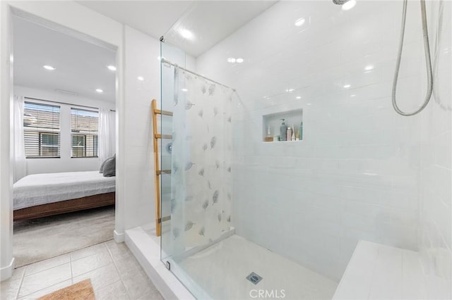 bathroom featuring tile patterned flooring and curtained shower