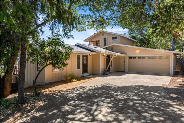 view of front of property with a garage