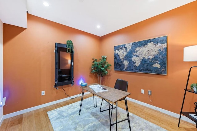 home office with light wood-type flooring