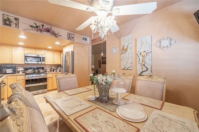 dining area with ceiling fan