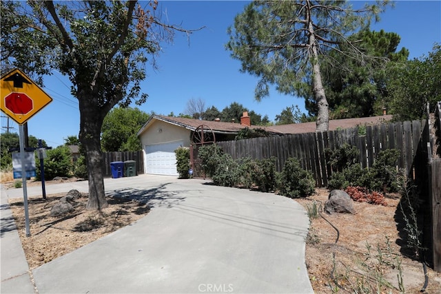 exterior space with a garage