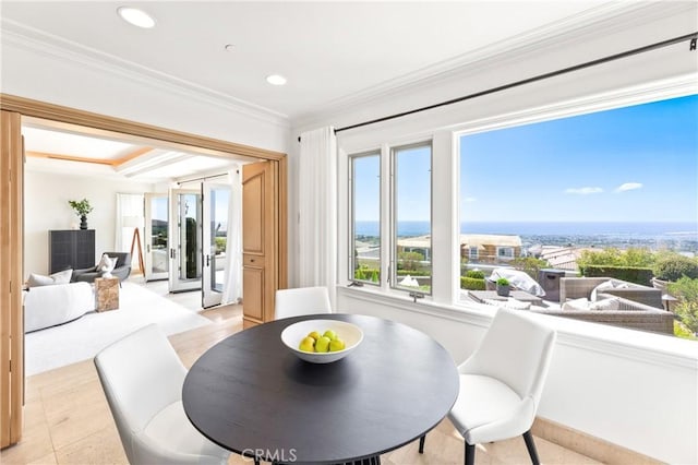 dining space featuring ornamental molding