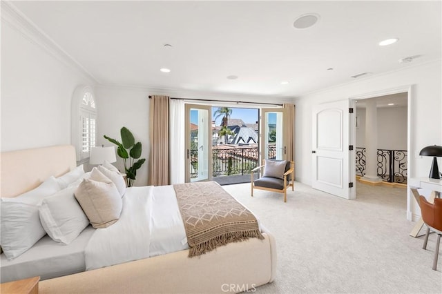 carpeted bedroom with access to exterior and crown molding