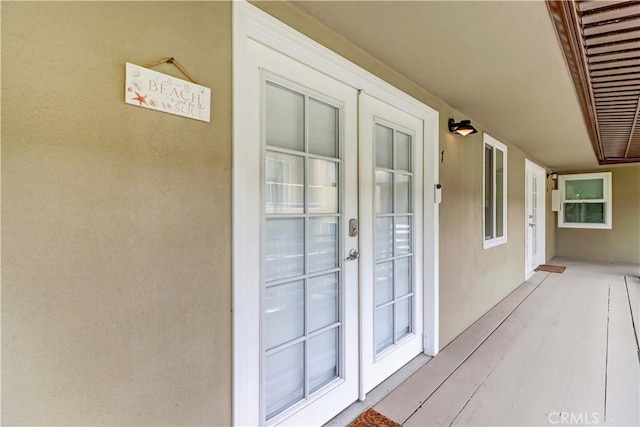 387 Cypress Dr Unit 7, Laguna Beach, CA 92651 - view of exterior entry with stucco siding