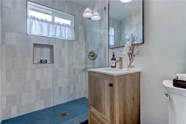 387 Cypress Dr Unit 7, Laguna Beach, CA 92651 - full bath featuring a walk in shower, vanity, and toilet