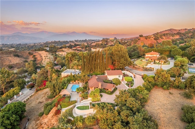 aerial view at dusk with a mountain view